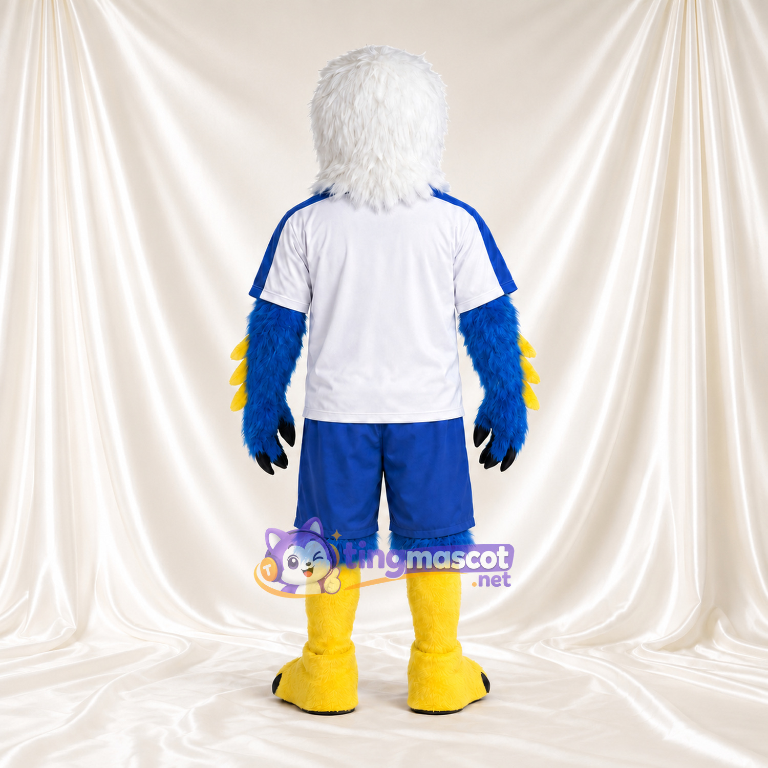 Costume de mascotte Pygargue à tête blanche – bleu – Maillot de sport (bleu, blanc) Costume de mascotte Pygargue à tête blanche – bleu – Maillot de sport (bleu, blanc)