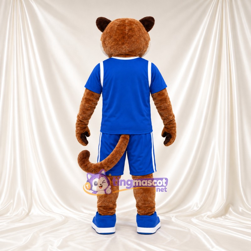 Brown Cougar Mascot Costume - Blue Sports Uniform and Blue Sneakers Brown Cougar Mascot Costume - Blue Sports Uniform and Blue Sneakers