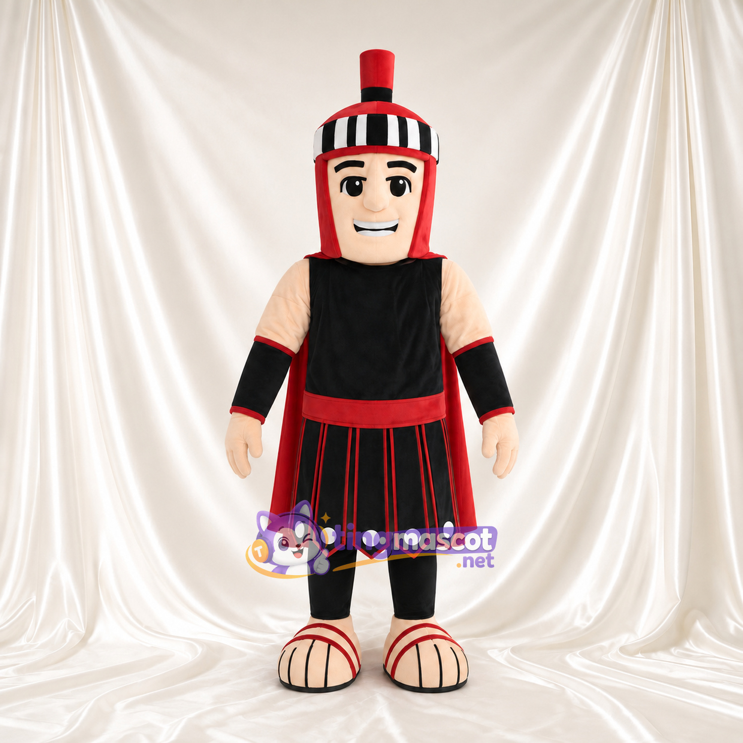 Costume de mascotte Guerrier romain – selon la photo – Armure (noir); Bordure (rouge) Costume de mascotte Guerrier romain – selon la photo – Armure (noir); Bordure (rouge)