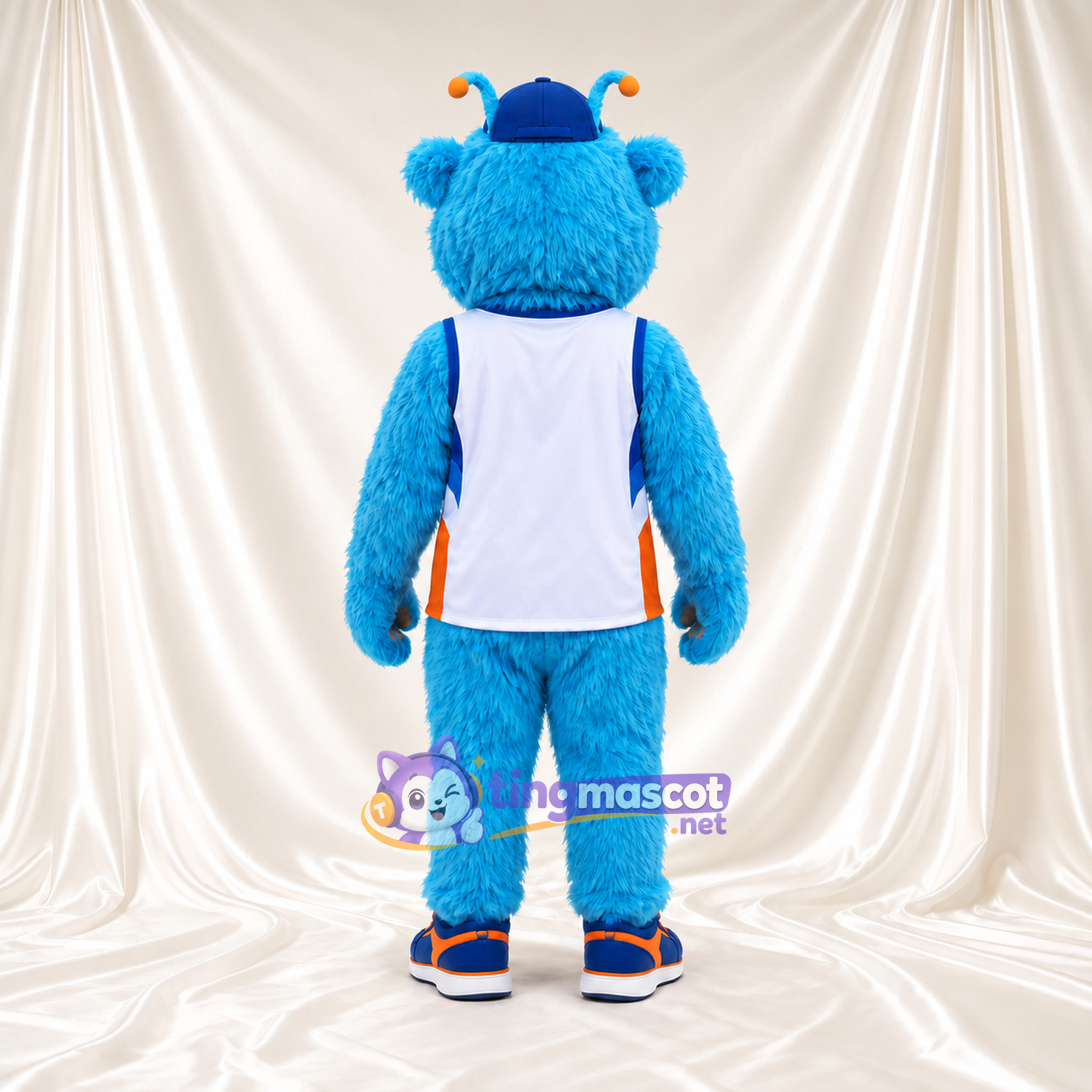 Costume de mascotte Monstre – bleu – Casquette (bleu); Haut (blanc, de sport) Costume de mascotte Monstre – bleu – Casquette (bleu); Haut (blanc, de sport)