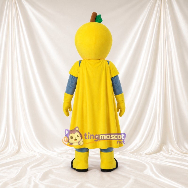 Gelbes Frucht-Superheld-Maskottchenkostüm – blaue Latzhose und gelber Umhang Gelbes Frucht-Superheld-Maskottchenkostüm – blaue Latzhose und gelber Umhang