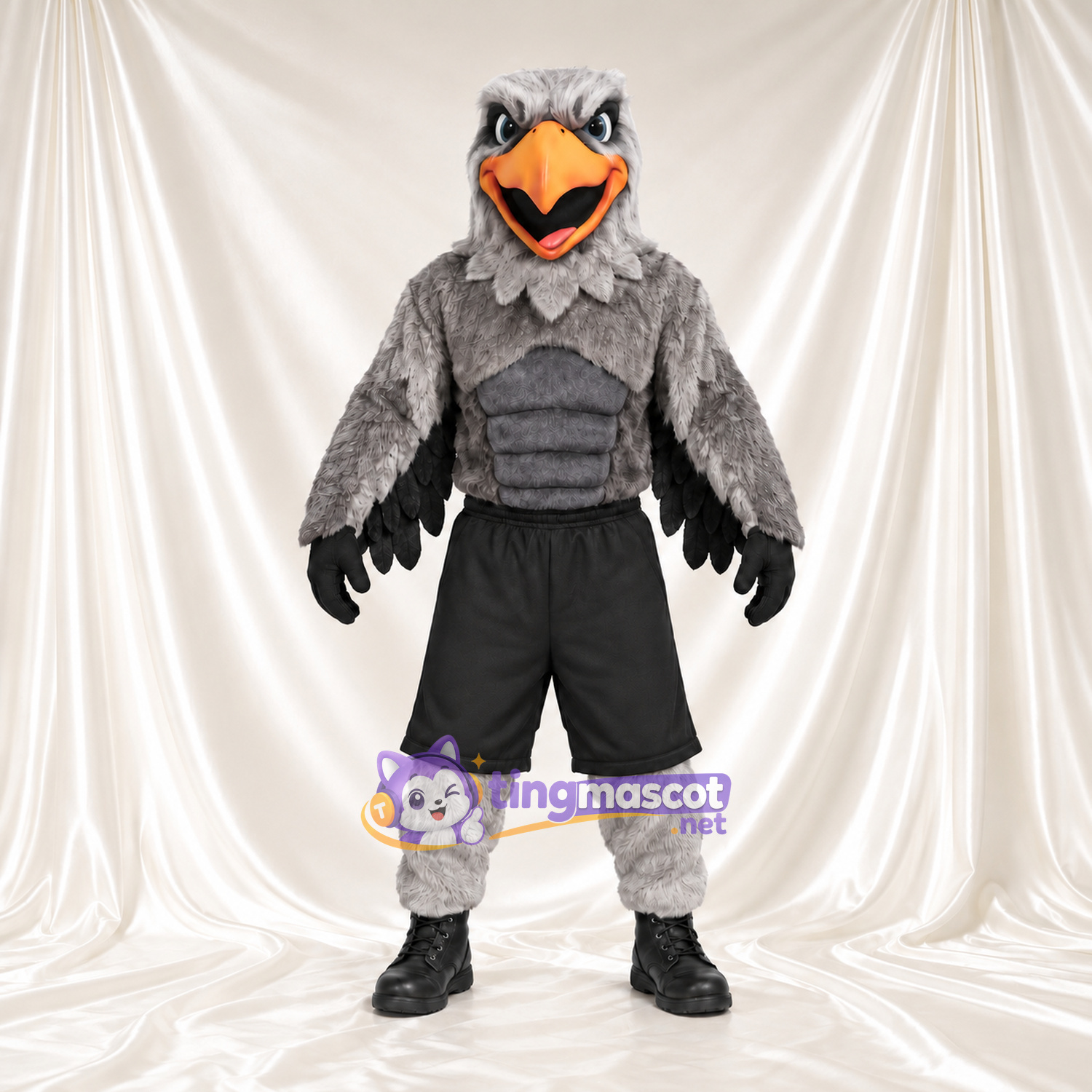 Maskottchenkostüm Adler – grau – Brust (muskulös); Shorts (schwarz) Maskottchenkostüm Adler – grau – Brust (muskulös); Shorts (schwarz)