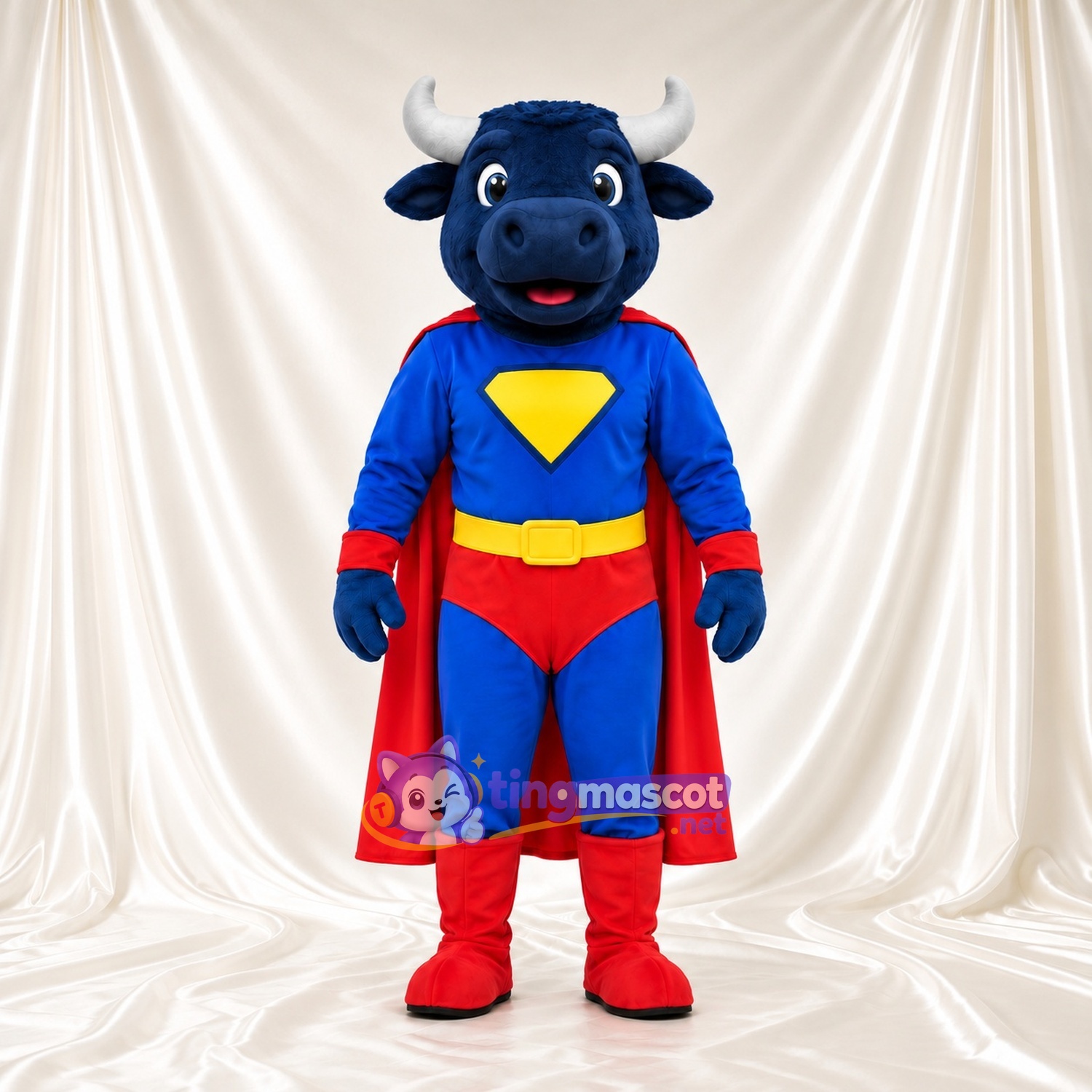 Costume de mascotte Taureau super-héros – bleu – Cape (rouge); Torse (jaune) Costume de mascotte Taureau super-héros – bleu – Cape (rouge); Torse (jaune)