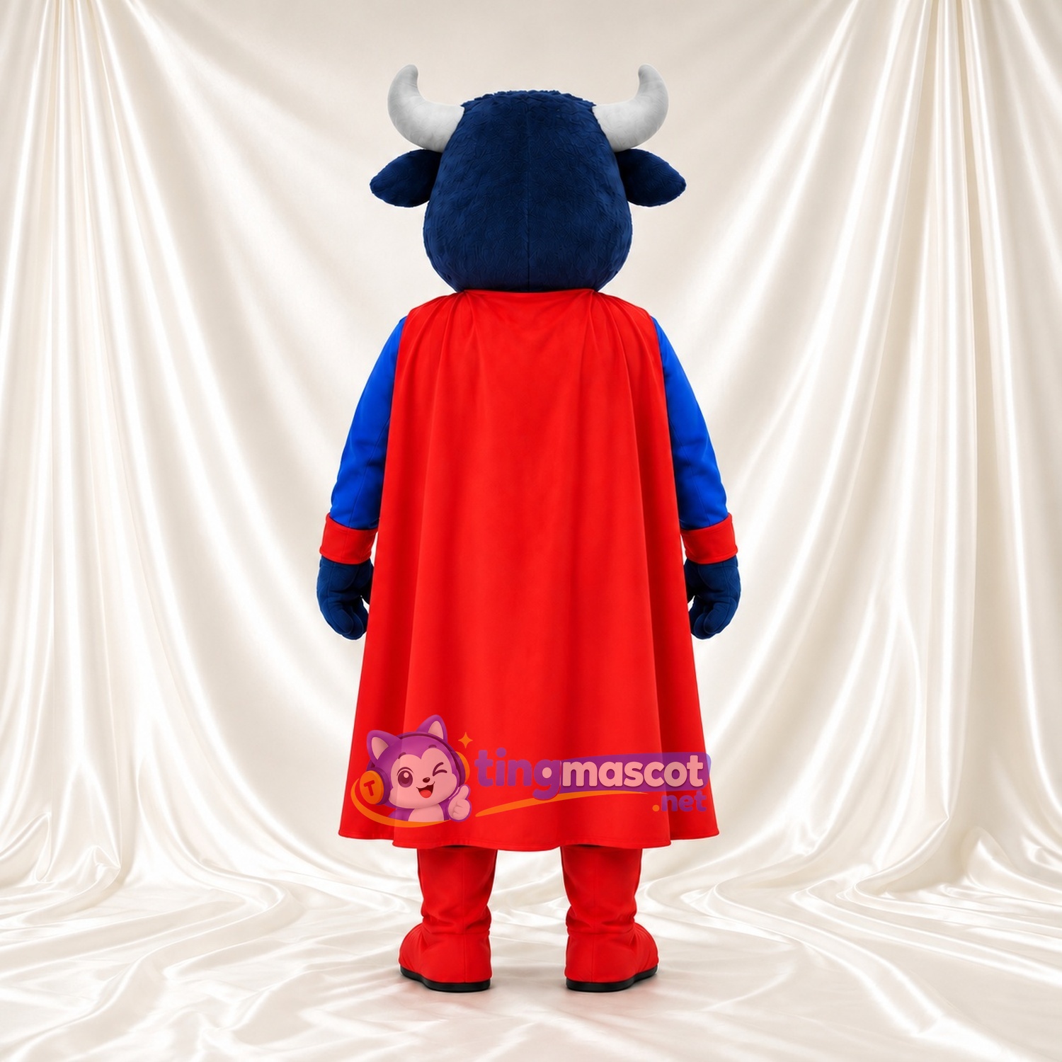 Costume de mascotte Taureau super-héros – bleu – Cape (rouge); Torse (jaune) Costume de mascotte Taureau super-héros – bleu – Cape (rouge); Torse (jaune)