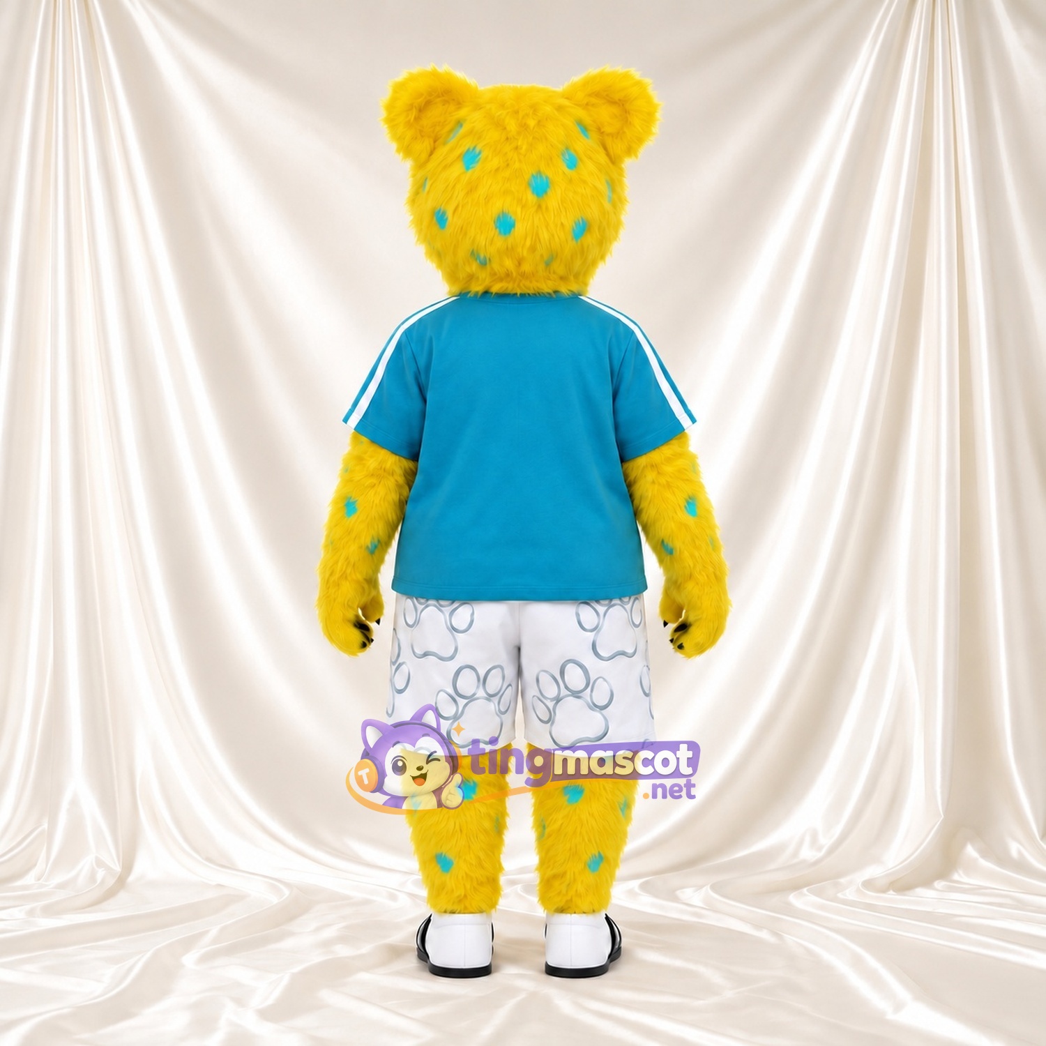 Costume de mascotte Léopard – jaune – Chemise (bleu canard); Short (blanc) Costume de mascotte Léopard – jaune – Chemise (bleu canard); Short (blanc)