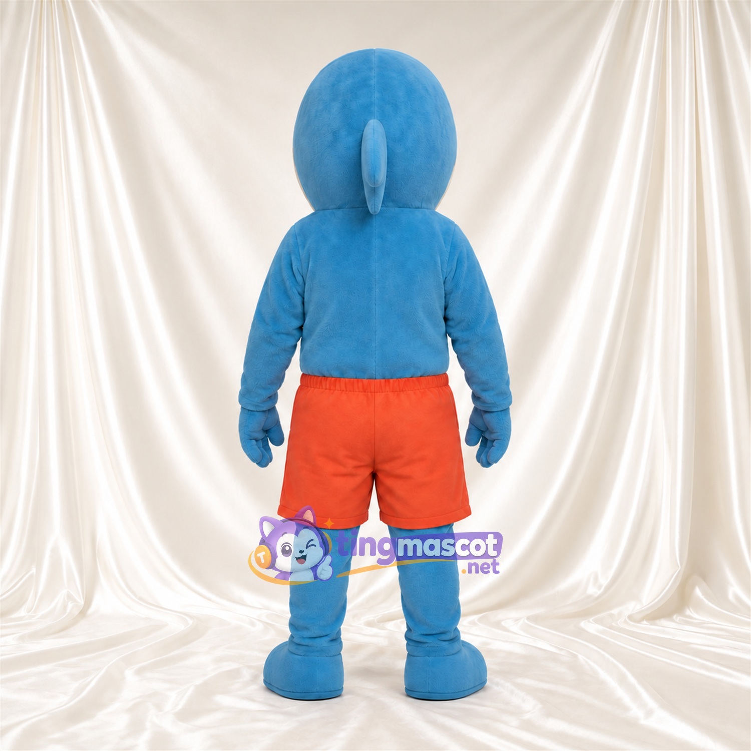 Maskottchenkostüm Delfin – blau – Bauch (creme); Shorts (orange) Maskottchenkostüm Delfin – blau – Bauch (creme); Shorts (orange)