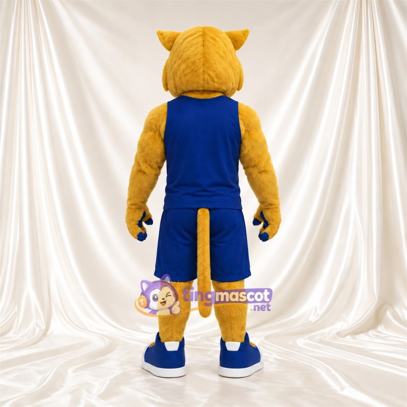 Costume de mascotte Chat sauvage – doré – Tenue de basket (bleu) Costume de mascotte Chat sauvage – doré – Tenue de basket (bleu)
