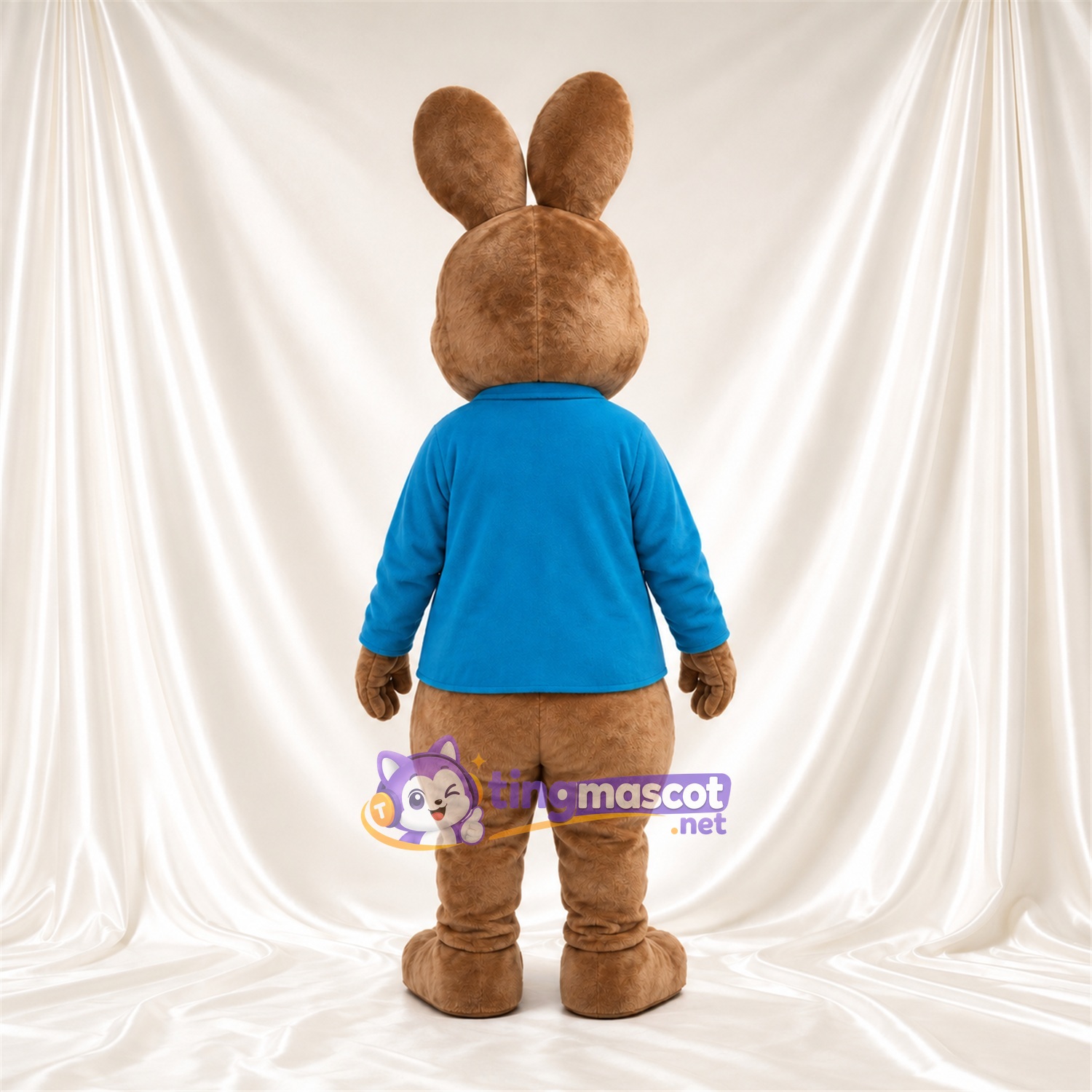 Costume de mascotte Peter Rabbit – selon la photo – Veste (bleu); Ventre (crème) Costume de mascotte Peter Rabbit – selon la photo – Veste (bleu); Ventre (crème)