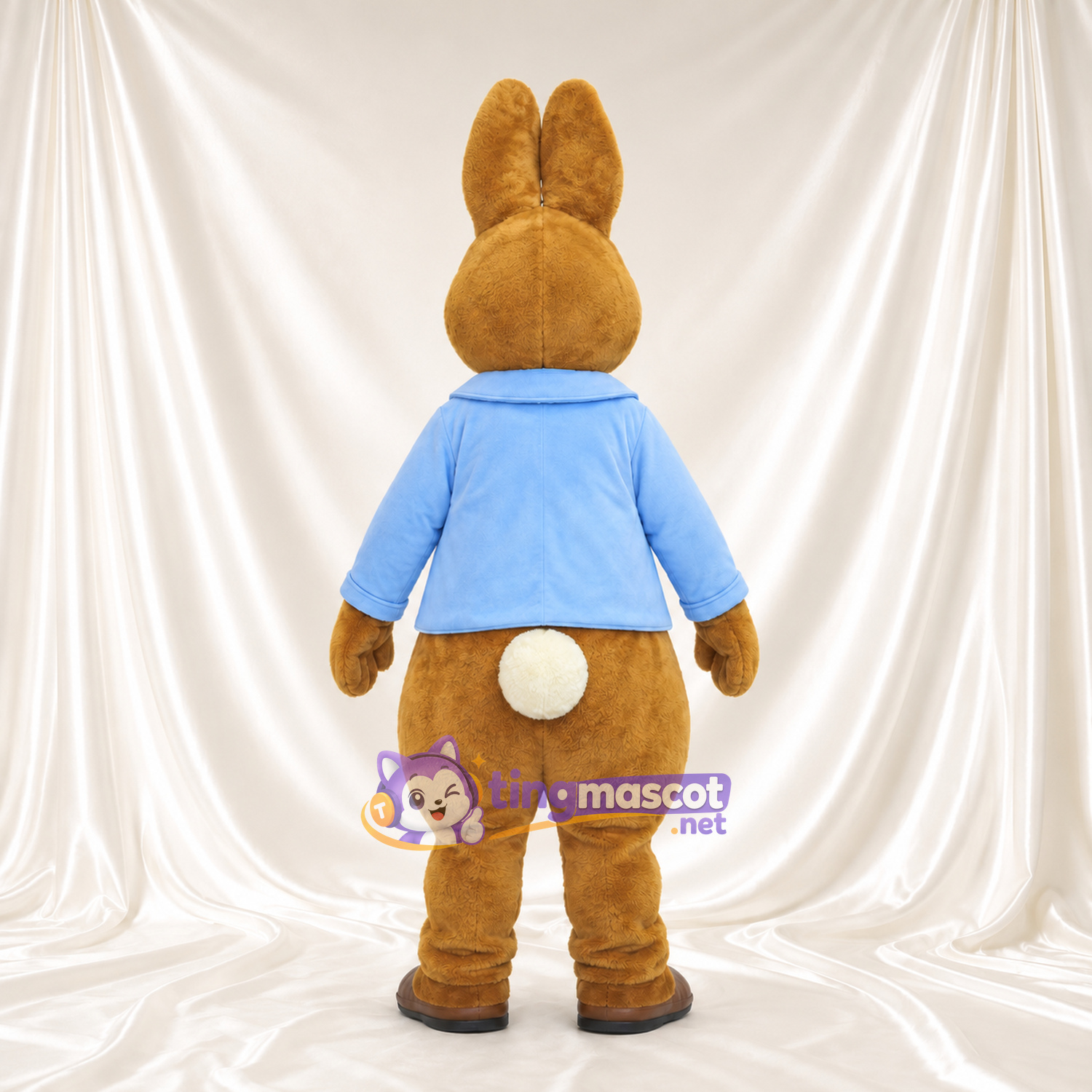 Costume de mascotte Peter Rabbit – selon la photo – Veste (bleu clair); Ventre (crème) Costume de mascotte Peter Rabbit – selon la photo – Veste (bleu clair); Ventre (crème)