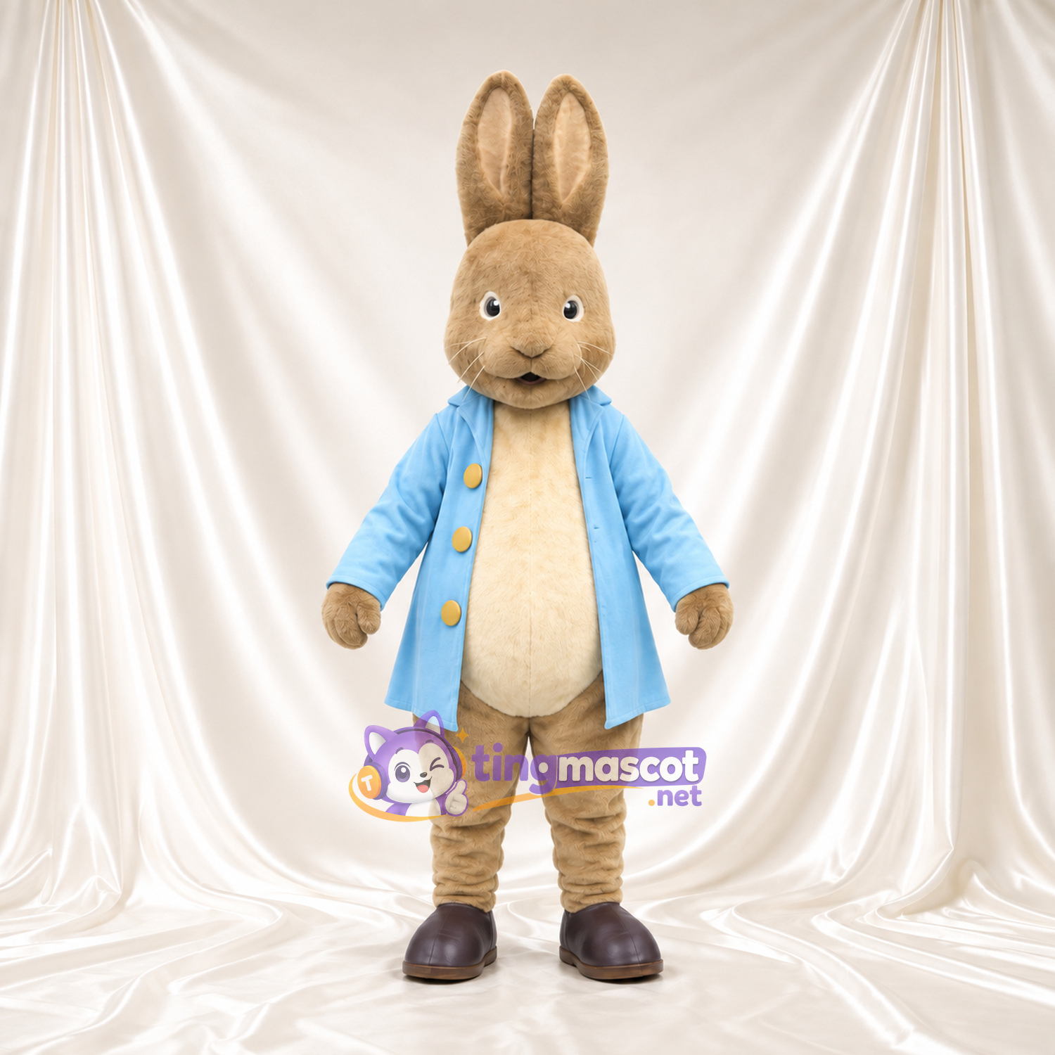Costume de mascotte Peter Rabbit – selon la photo – Manteau (bleu); Ventre (crème) Costume de mascotte Peter Rabbit – selon la photo – Manteau (bleu); Ventre (crème)