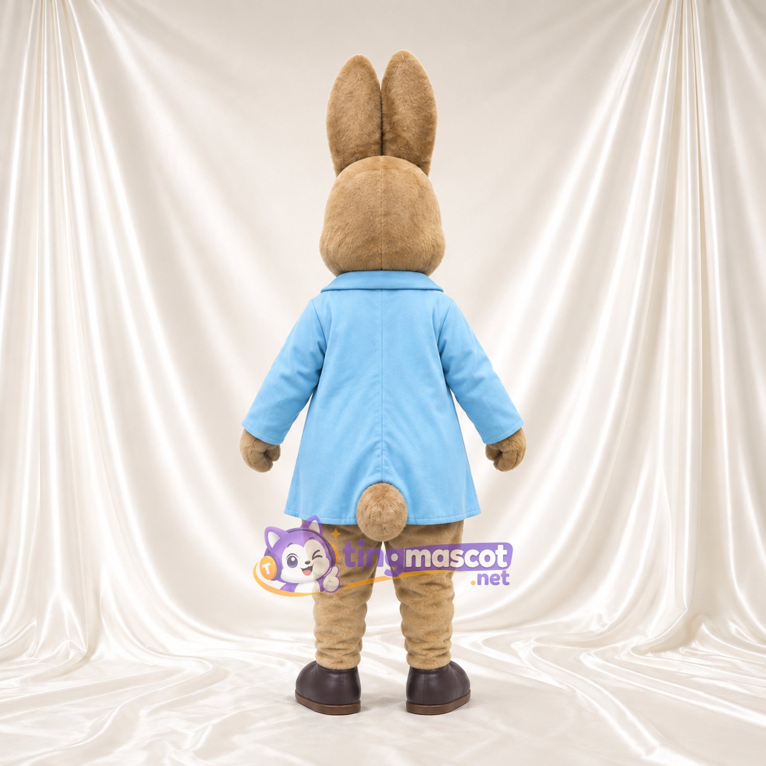 Costume de mascotte Peter Rabbit – selon la photo – Manteau (bleu); Ventre (crème) Costume de mascotte Peter Rabbit – selon la photo – Manteau (bleu); Ventre (crème)
