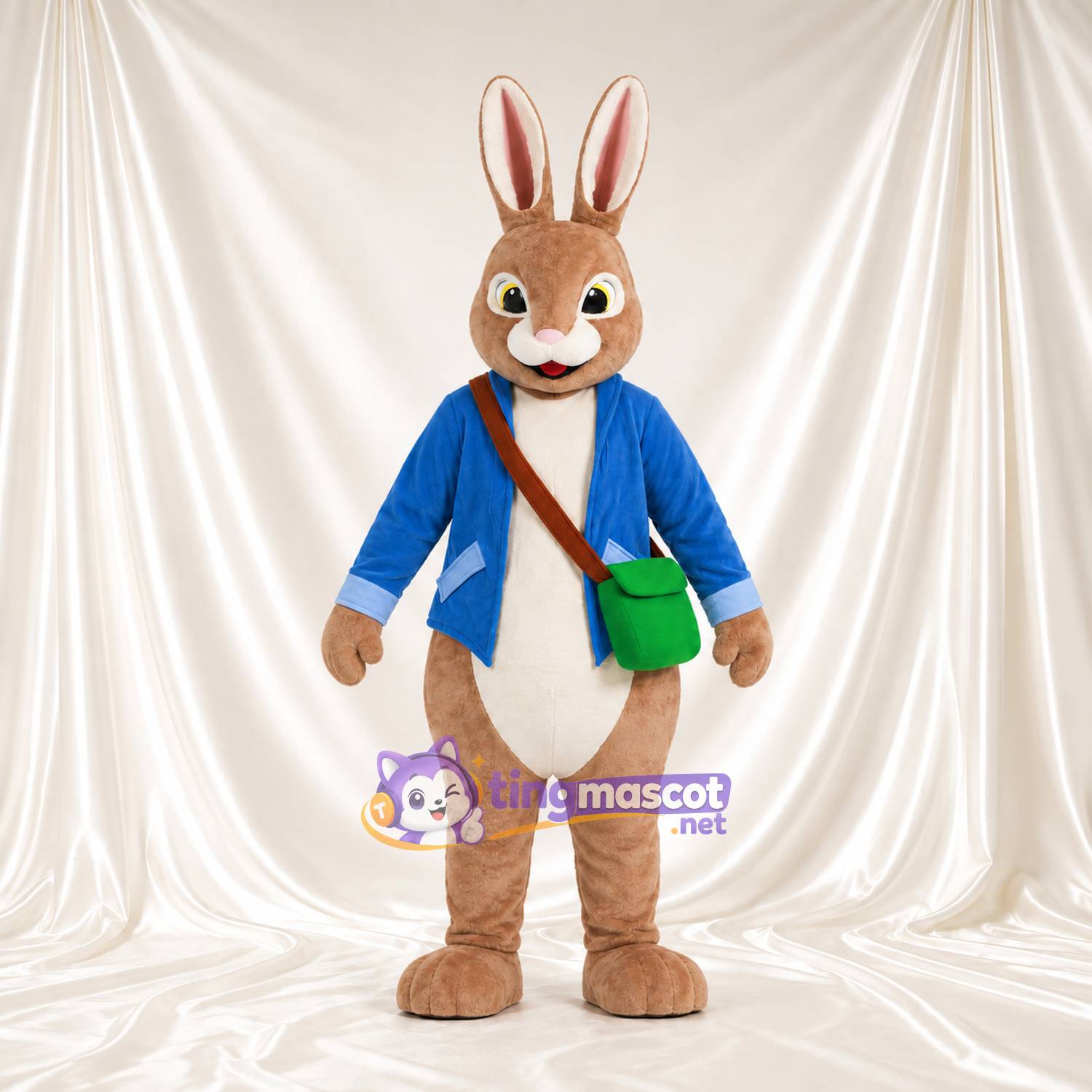 Costume de mascotte Peter Rabbit – selon la photo – Veste (bleu); Sac à bandoulière (vert) Costume de mascotte Peter Rabbit – selon la photo – Veste (bleu); Sac à bandoulière (vert)