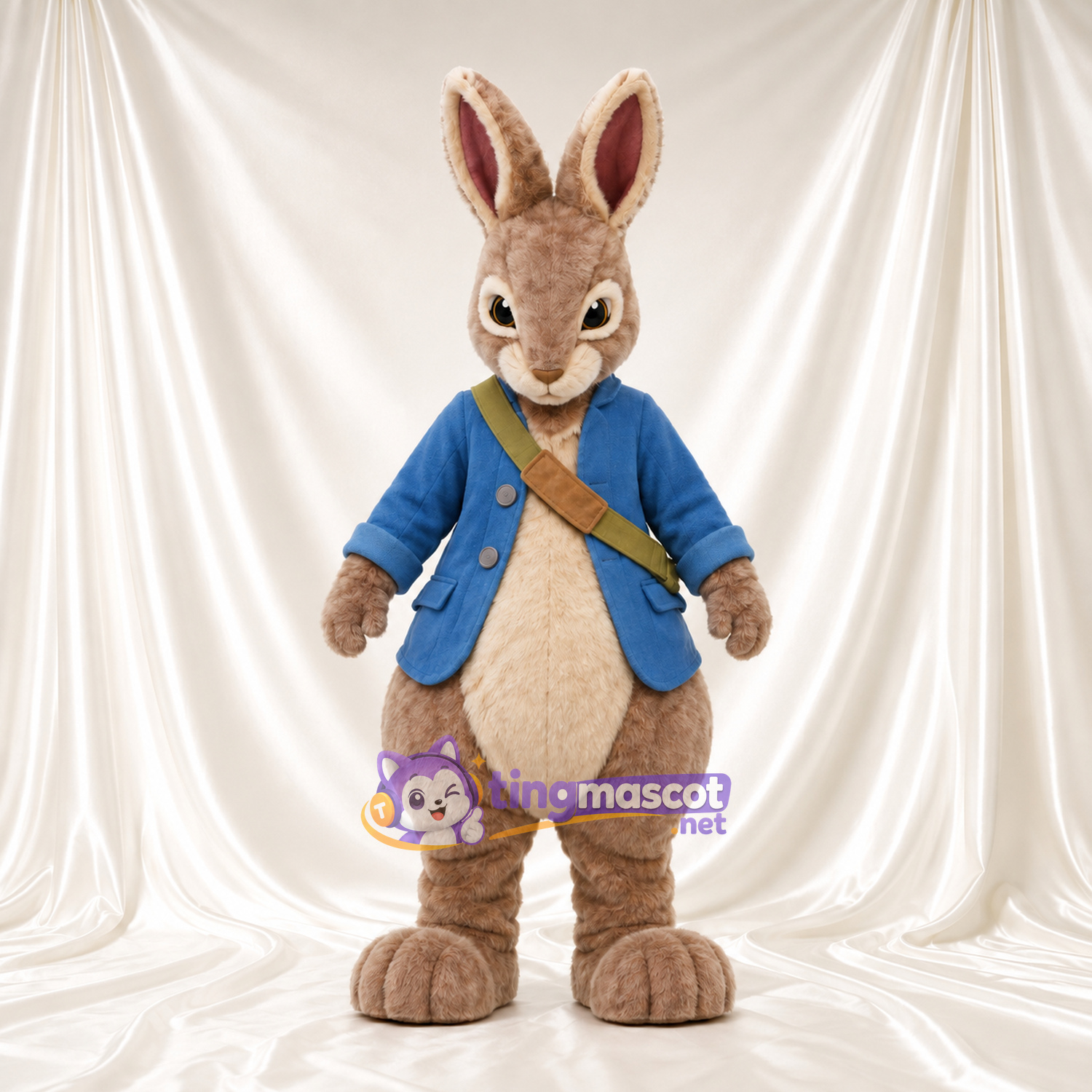 Costume de mascotte Peter Rabbit – selon la photo – Veste (bleu); Bandoulière (marron) Costume de mascotte Peter Rabbit – selon la photo – Veste (bleu); Bandoulière (marron)