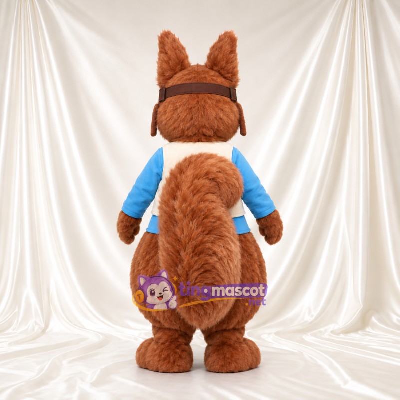Maskottchenkostüm Squirrel Nutkin – wie abgebildet – Hemd (blau); Kappe (braun) Maskottchenkostüm Squirrel Nutkin – wie abgebildet – Hemd (blau); Kappe (braun)