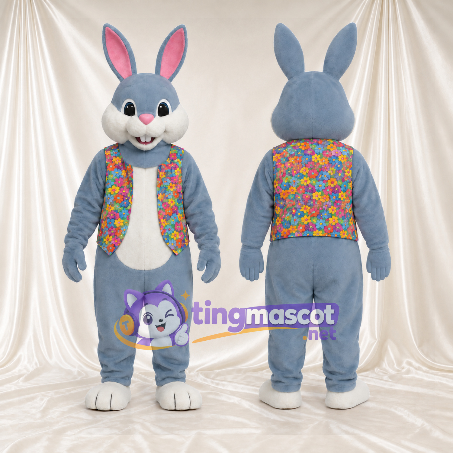 Maskottchenkostüm Hase – blau / grau – Weste (bunt, mit Blumenmuster) Maskottchenkostüm Hase – blau / grau – Weste (bunt, mit Blumenmuster)