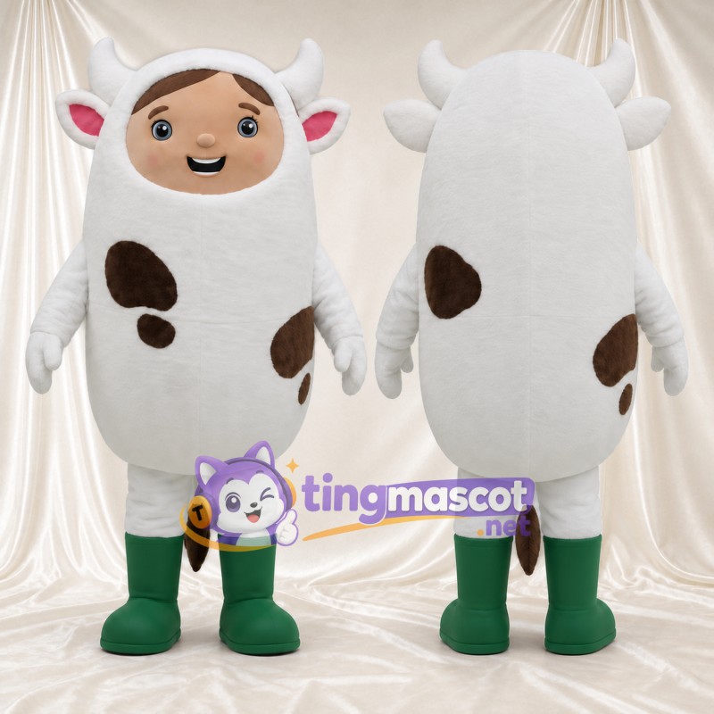 Costume de mascotte personnage en tenue de vache – corps blanc tacheté et bottes vertes